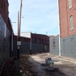 Alleyway off 15th Street between warehouses Alleyway off 15th Street between warehouses