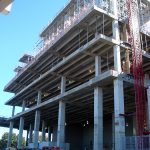 Cantilevered structure hints at future curved facade Cantilevered structure hints at future curved facade