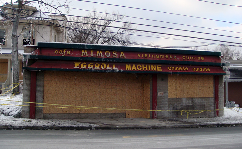 Cafe Mimosa Boarded Up After Fire (BS File Photo)