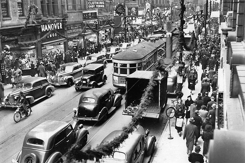 Crowds pack Fourth Street in the early '40s for the holiday shopping season. (Courtesy UL Photo Archives)
