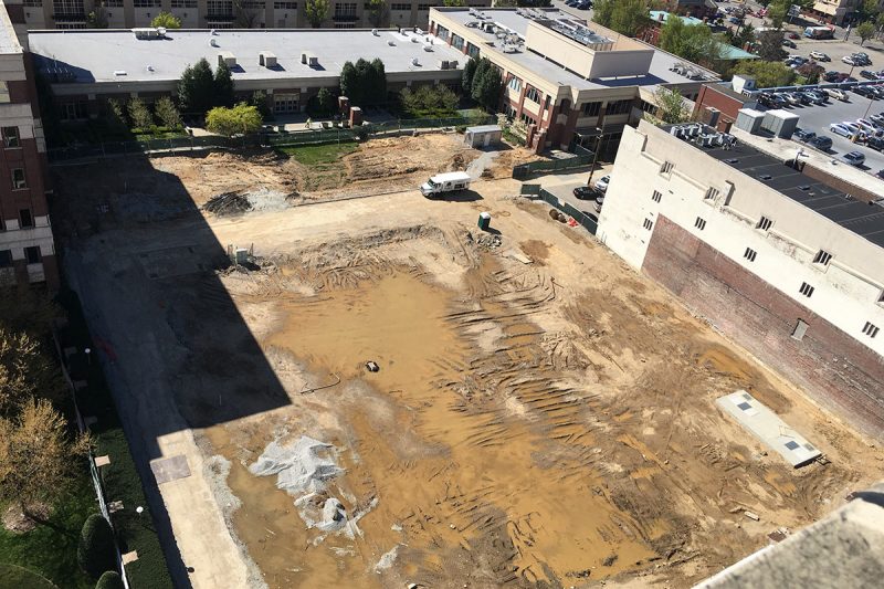 The project site is a flat dirt lot today. (Branden Klayko / Broken Sidewalk)