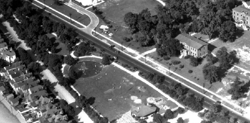 Aerial view of Third Street Triangle Park, now Stansbury Park, circa 1928, showing a large children's play pool, lawn, and bandstand. (Courtesy Stansbury Park Master Plan)