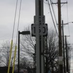 Preston @ Grey: not my job to move the highway sign. I just install poles. (Courtesy SushiK