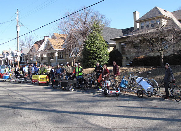 A crowd with cargo-bikes gathers for a bike move. (Courtesy Bicycling for Louisville)
