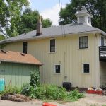 2325 Basset Ave. Note the stall windows at the ground floor and the cupola which would have provided natural ventilation for horses. (Christopher Quirk)