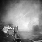 A historic look at firemen at work in Louisville. (Courtesy UL Photographic Archives)