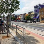 Tracks in the street and permanent stations let people know where the DC Streetcar will stop. (BeyondDC / Flickr)