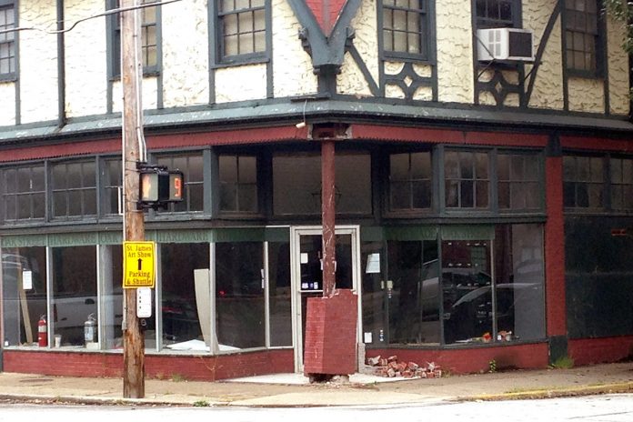 Damage from a motorist hitting a building in Old Louisville. (Branden Klayko / Broken Sidewalk)